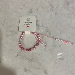 Kid’s size pink and white bracelet